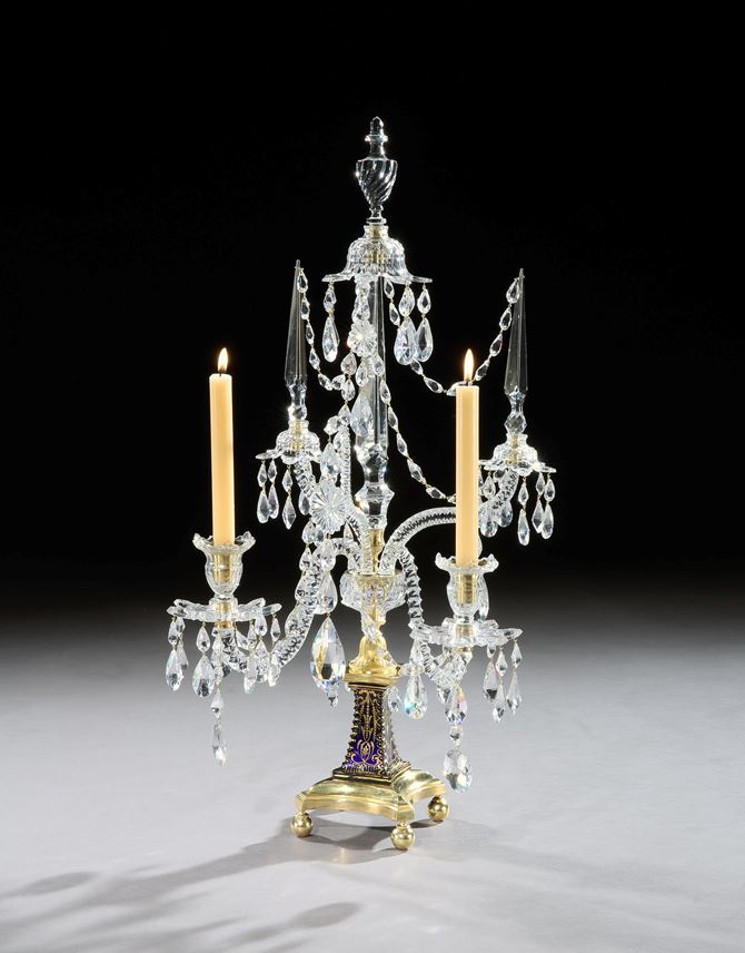 A PAIR OF GEORGE III ORMOLU MOUNTED CUT GLASS TWO LIGHT CANDELABRA BY WILLIAM PARKER &amp; SON | MasterArt